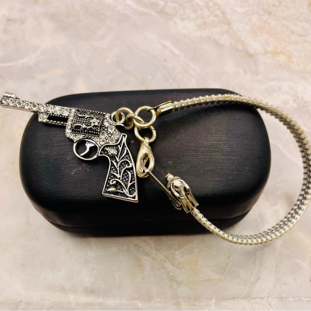 Vintage Design Silver Rhinestone Revolver Charm on a Zipper Bracelet. 8 inches